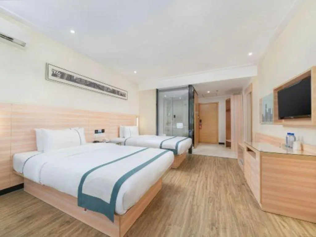 Bed in City Comfort Inn Yulin Wenhua Square Wanda Plaza