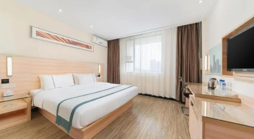 Bed in City Comfort Inn Yulin Wenhua Square Wanda Plaza
