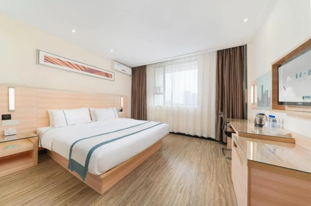 Bed in City Comfort Inn Yulin Wenhua Square Wanda Plaza