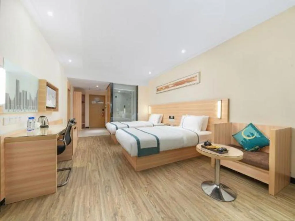 Bed in City Comfort Inn Yulin Wenhua Square Wanda Plaza