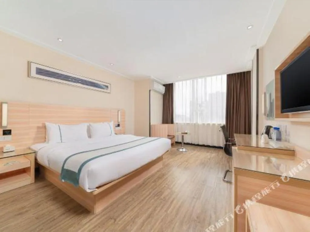 Bed in City Comfort Inn Yulin Wenhua Square Wanda Plaza