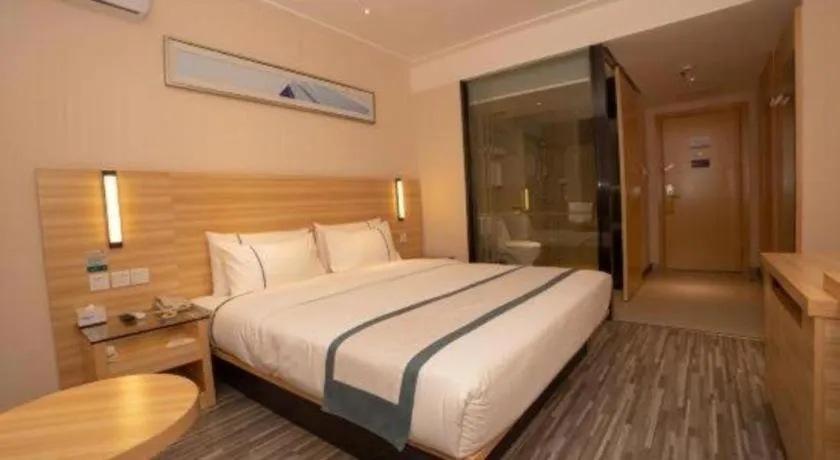 Bed in City Comfort Inn Yulin Wenhua Square Wanda Plaza