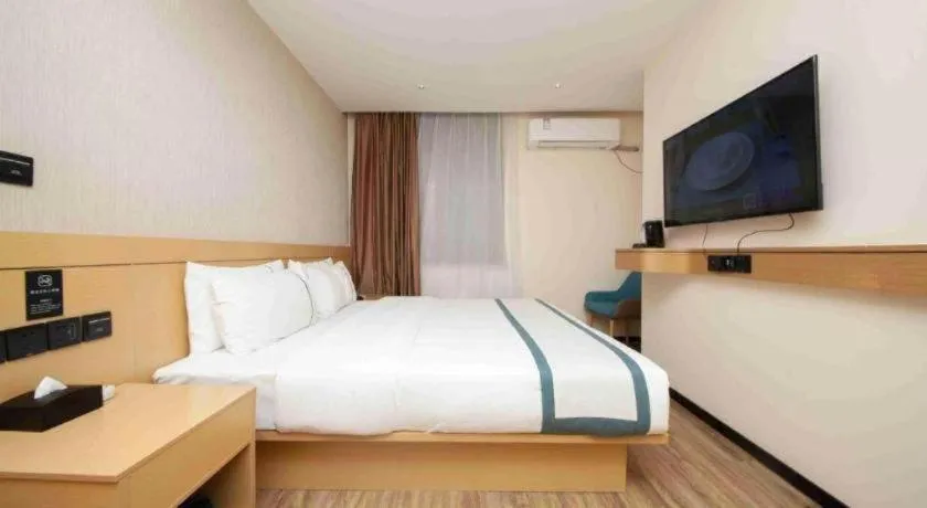 Bed in City Comfort Inn Yulin Wenhua Square Wanda Plaza