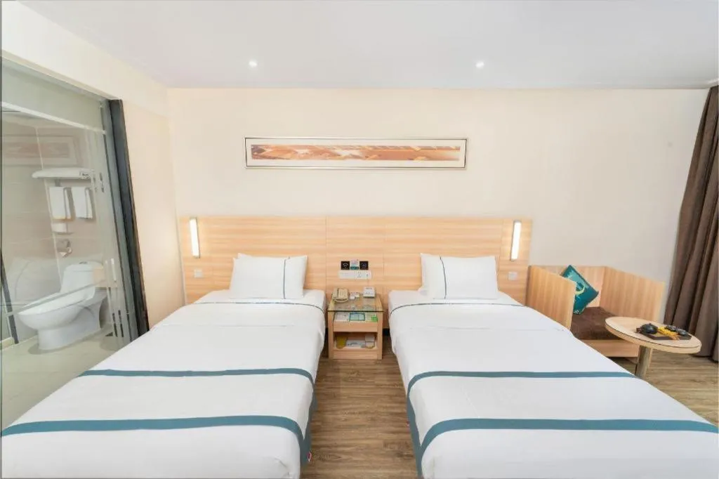 Bed in City Comfort Inn Yulin Wenhua Square Wanda Plaza