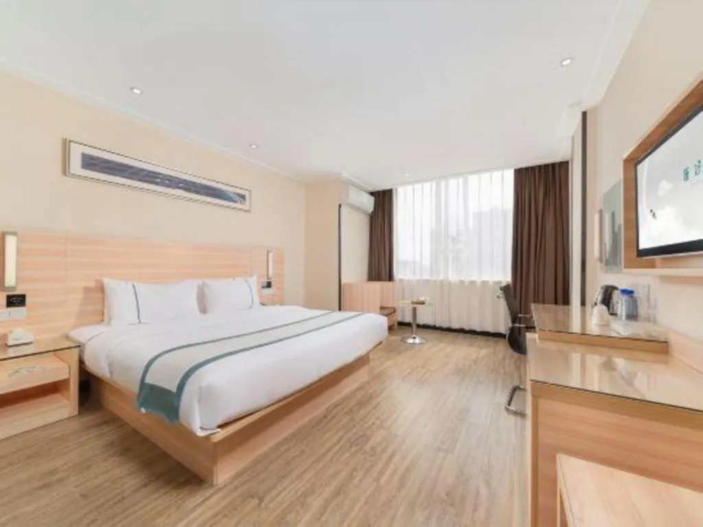 Bed in City Comfort Inn Yulin Wenhua Square Wanda Plaza