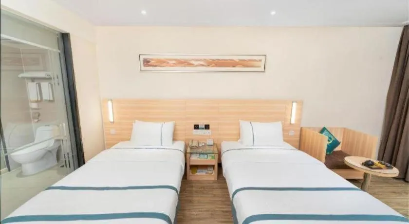 Bed in City Comfort Inn Yulin Wenhua Square Wanda Plaza