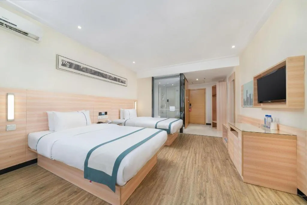 Bed in City Comfort Inn Yulin Wenhua Square Wanda Plaza