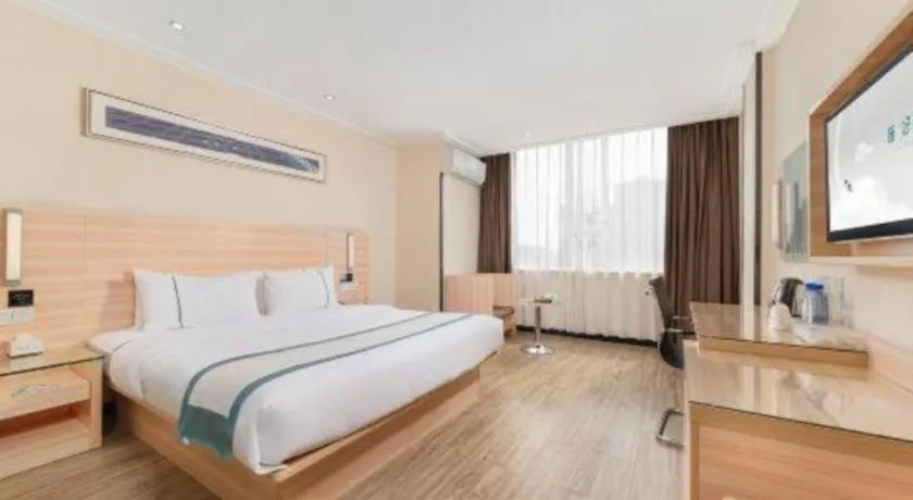 Bed in City Comfort Inn Yulin Wenhua Square Wanda Plaza