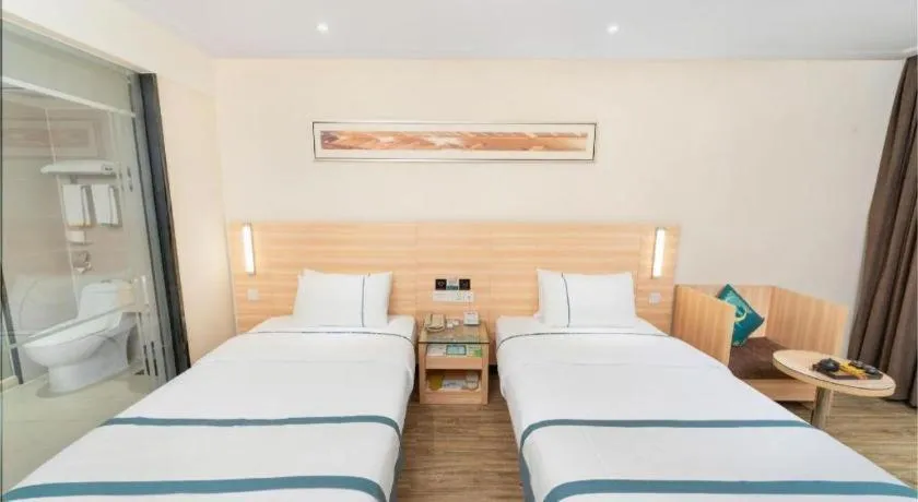 Bed in City Comfort Inn Yulin Wenhua Square Wanda Plaza