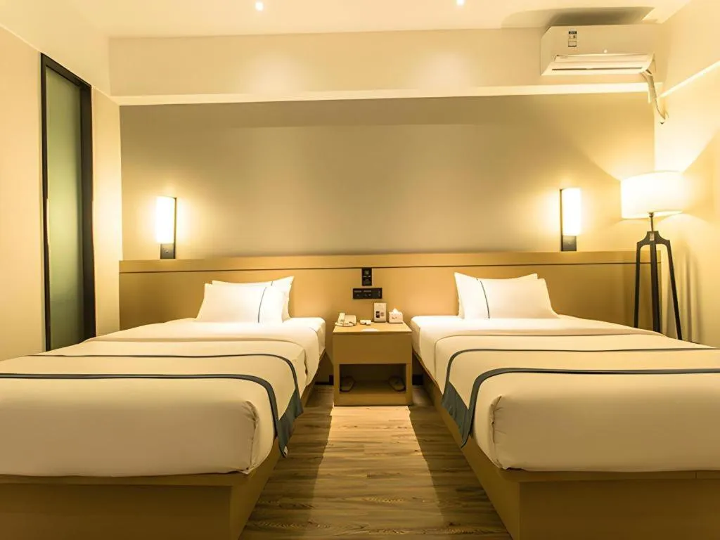 Bed in City Comfort Inn Nanning Anji Wanda Plaza