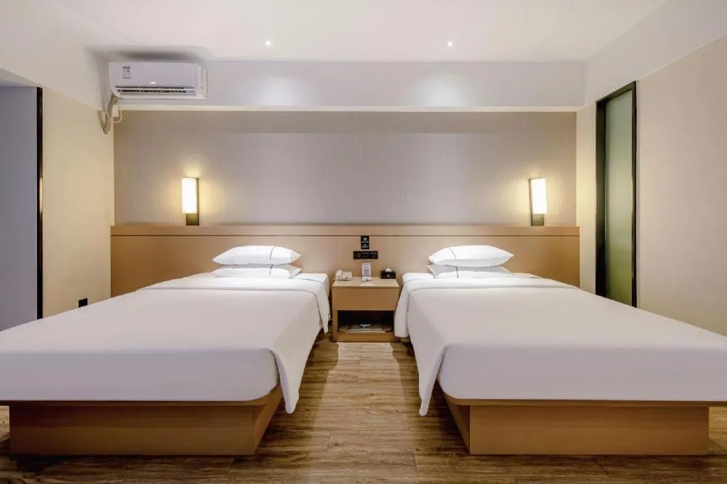 Bed in City Comfort Inn Nanning Anji Wanda Plaza