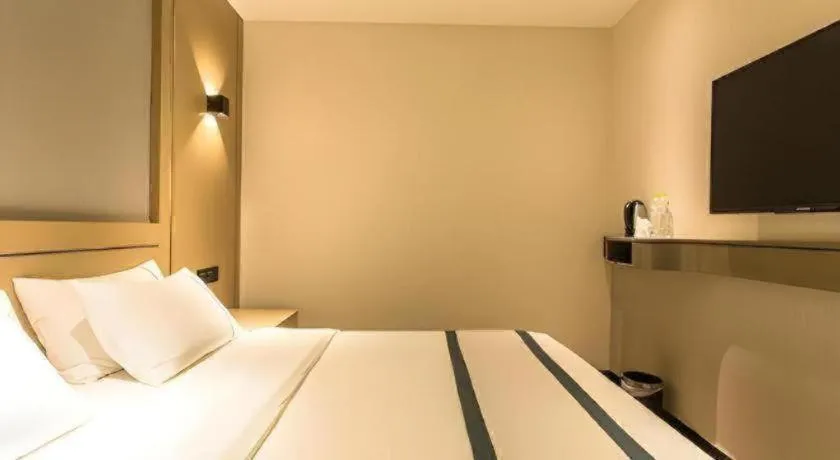 Bed in City Comfort Inn Nanning Anji Wanda Plaza