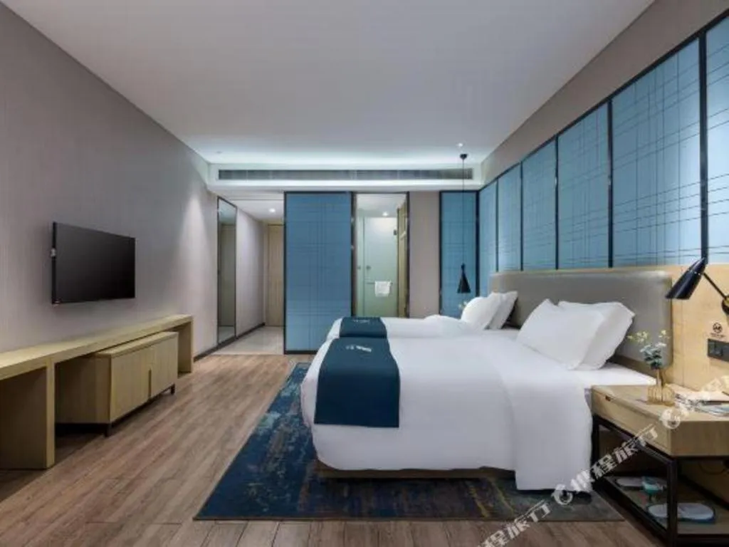 Bed in Echarm Hotel Danzhou Xiari Plaza