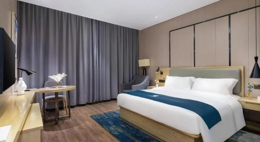 Bed in Echarm Hotel Danzhou Xiari Plaza