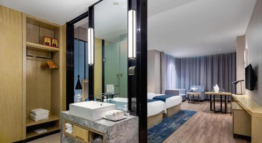 Bed in Echarm Hotel Danzhou Xiari Plaza