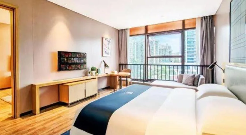Bed in Echarm Hotel Danzhou Xiari Plaza
