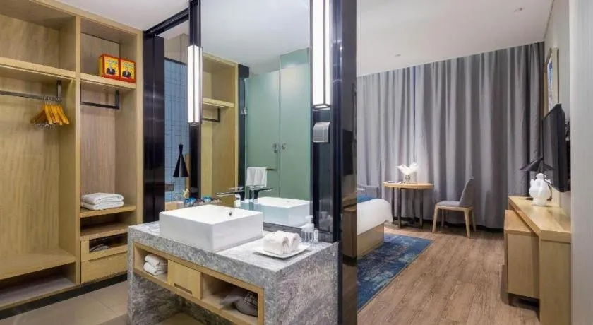 Bed in Echarm Hotel Danzhou Xiari Plaza