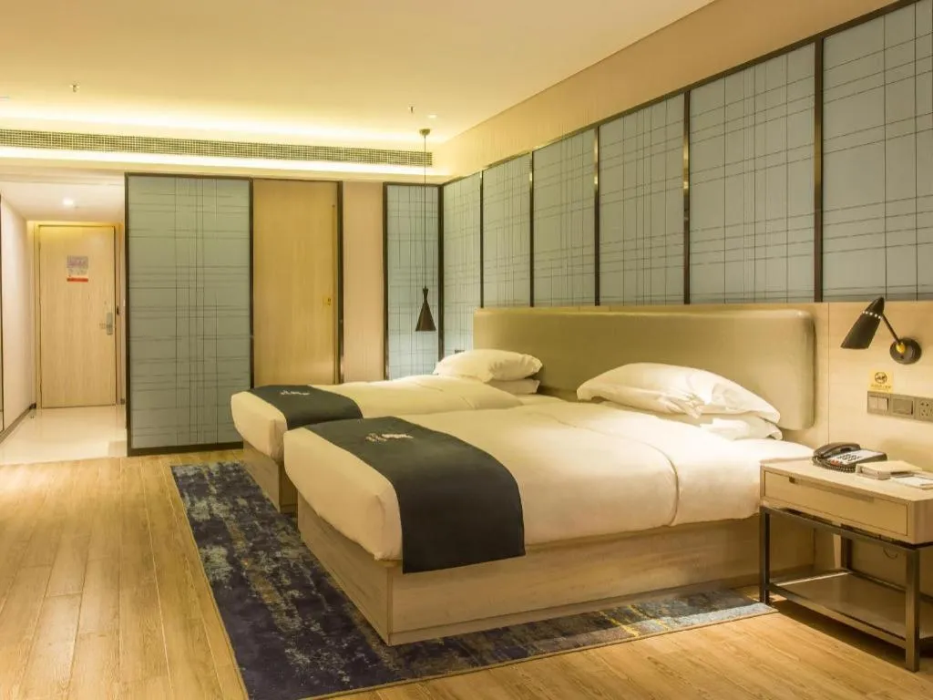 Bed in Echarm Hotel Danzhou Xiari Plaza