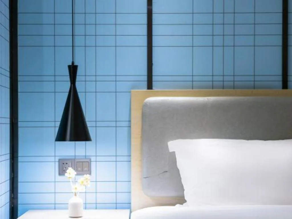 Bed in Echarm Hotel Danzhou Xiari Plaza