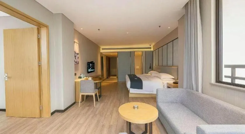 Bed in Echarm Hotel Danzhou Xiari Plaza