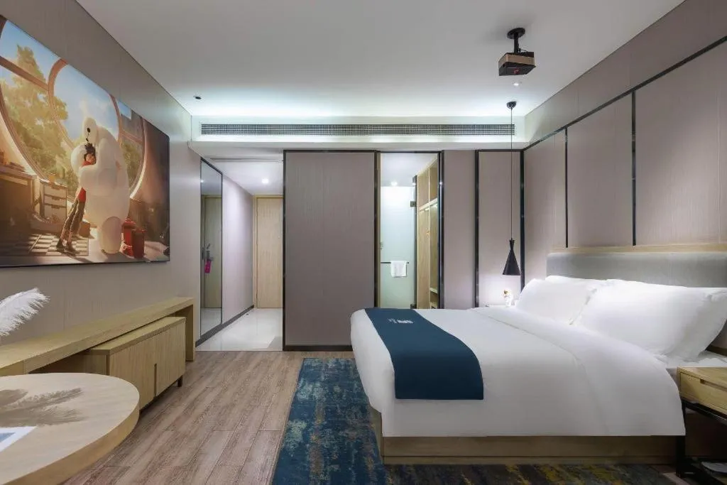 Bed in Echarm Hotel Danzhou Xiari Plaza