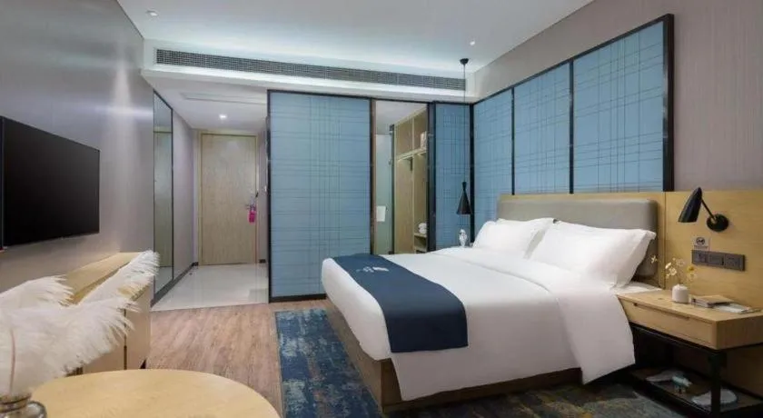 Bed in Echarm Hotel Danzhou Xiari Plaza