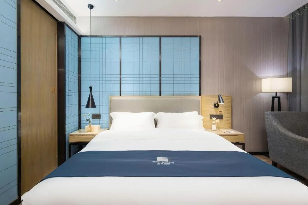 Bed in Echarm Hotel Danzhou Xiari Plaza