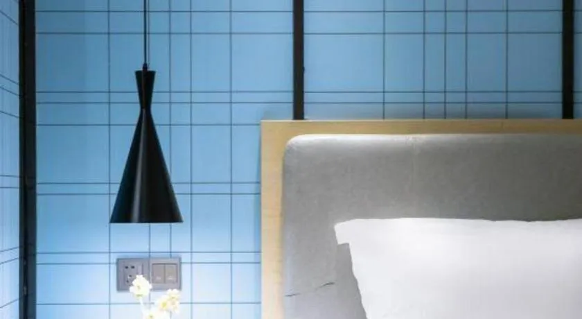 Bed in Echarm Hotel Danzhou Xiari Plaza