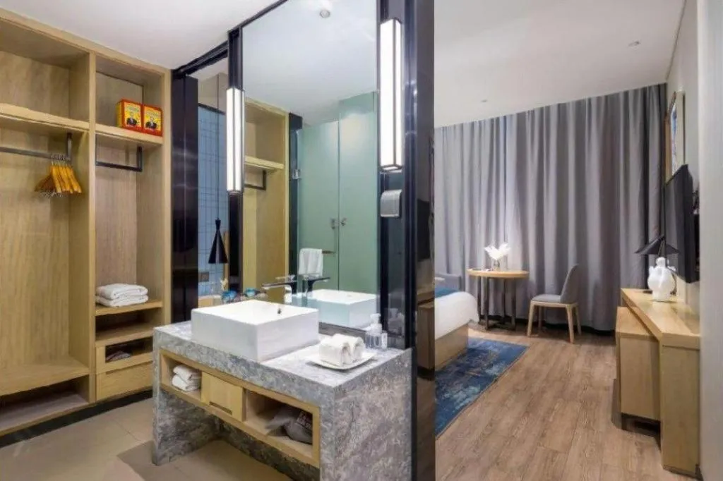 Bed in Echarm Hotel Danzhou Xiari Plaza