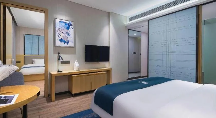 Bed in Echarm Hotel Danzhou Xiari Plaza