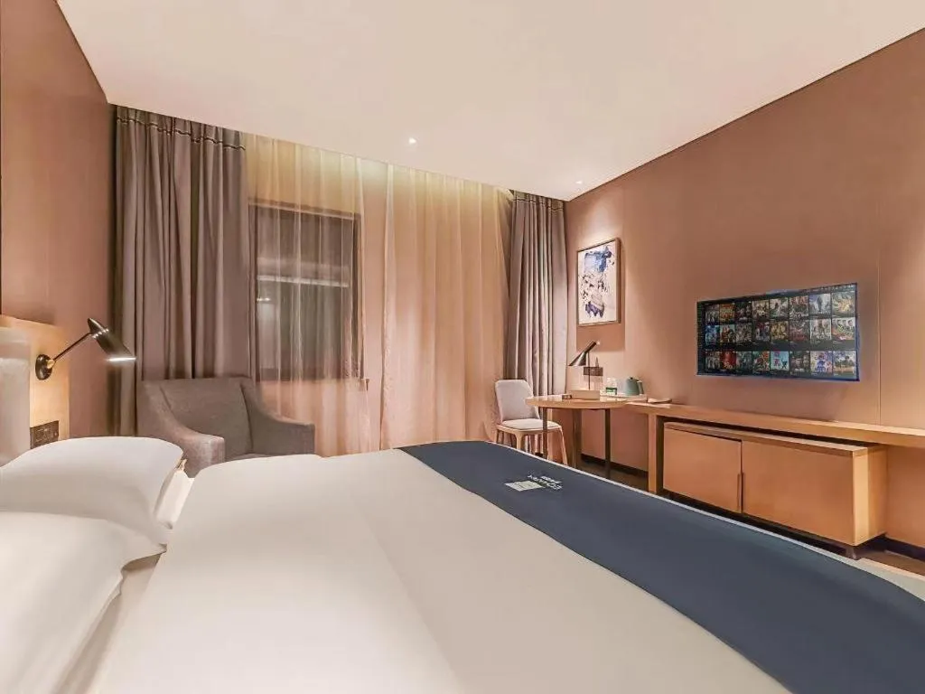 Bed in Echarm Hotel Danzhou Xiari Plaza