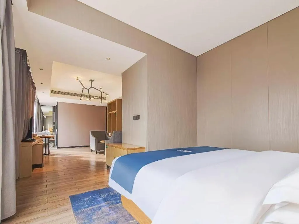 Bed in Echarm Hotel Danzhou Xiari Plaza