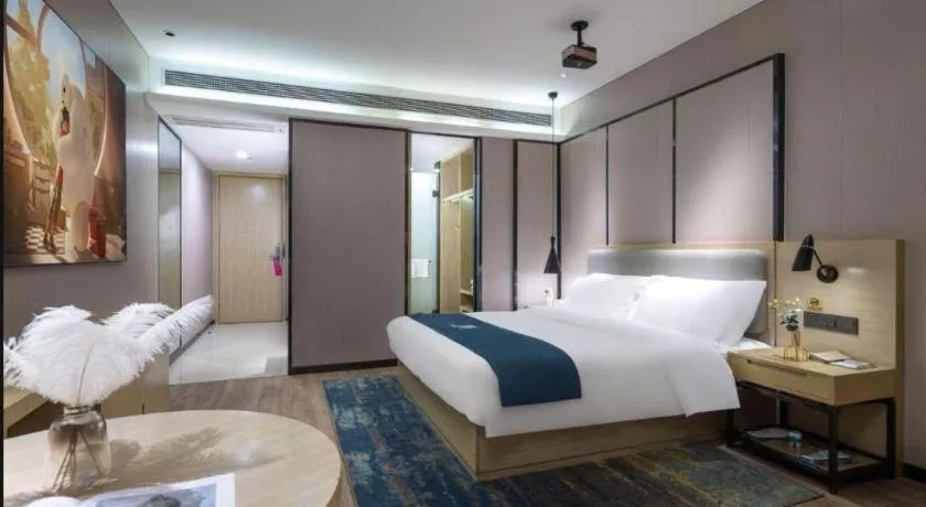 Bed in Echarm Hotel Danzhou Xiari Plaza