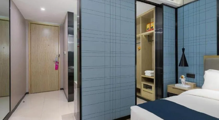 Bed in Echarm Hotel Danzhou Xiari Plaza