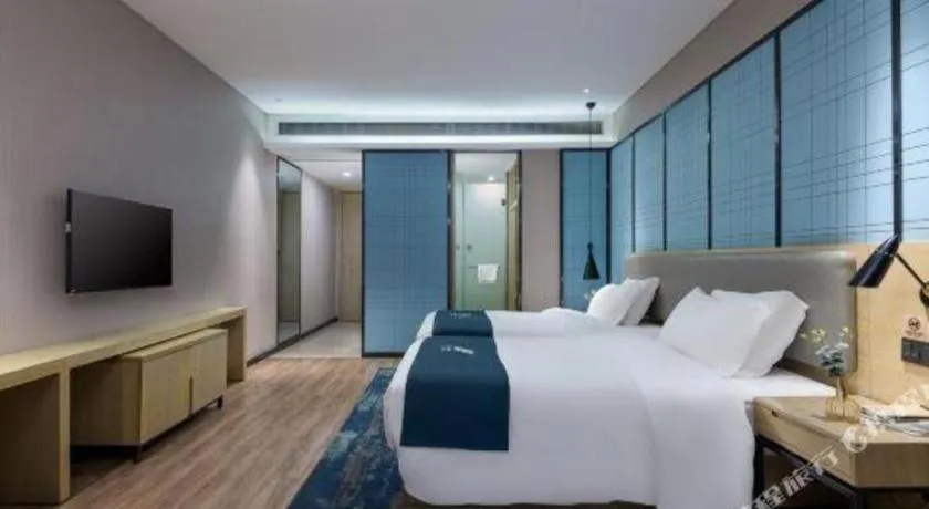 Bed in Echarm Hotel Danzhou Xiari Plaza