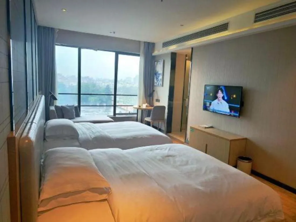 Bed in Echarm Hotel Danzhou Xiari Plaza