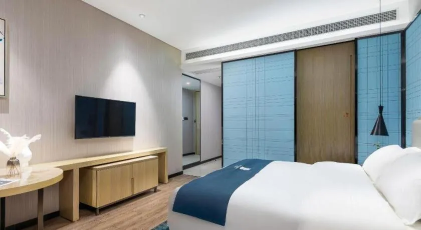 Bed in Echarm Hotel Danzhou Xiari Plaza