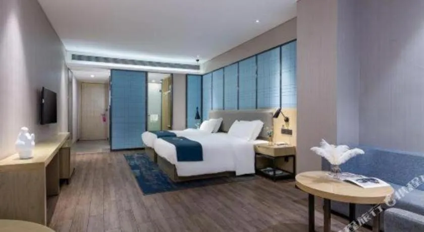 Bed in Echarm Hotel Danzhou Xiari Plaza