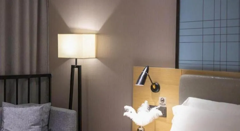 Bed in Echarm Hotel Danzhou Xiari Plaza