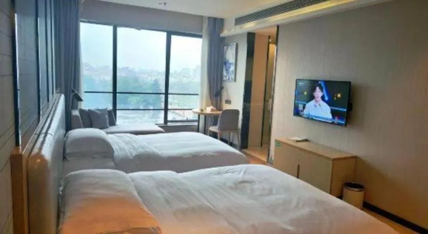 Bed in Echarm Hotel Danzhou Xiari Plaza