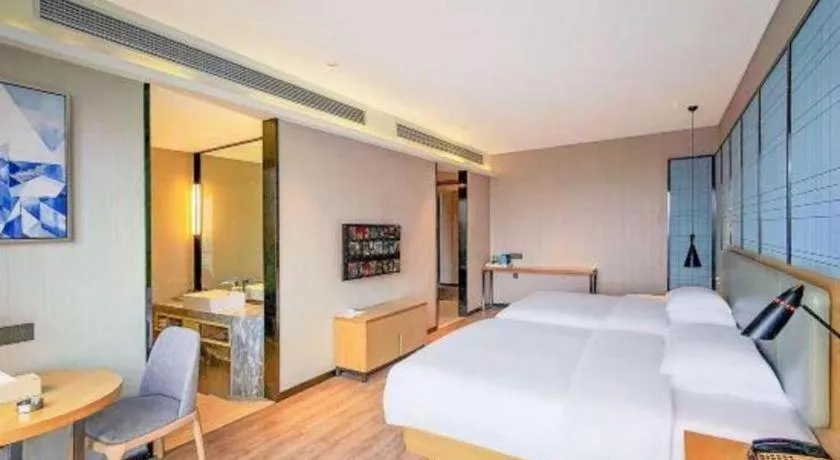Bed in Echarm Hotel Danzhou Xiari Plaza