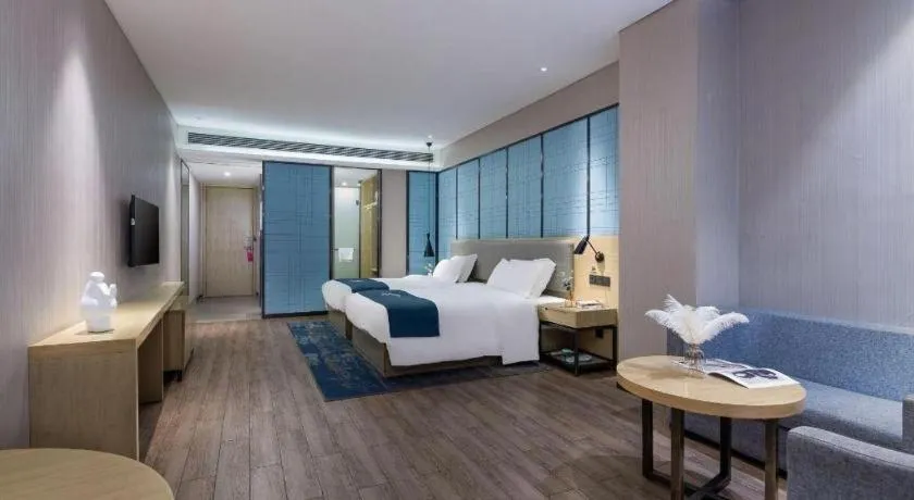 Bed in Echarm Hotel Danzhou Xiari Plaza