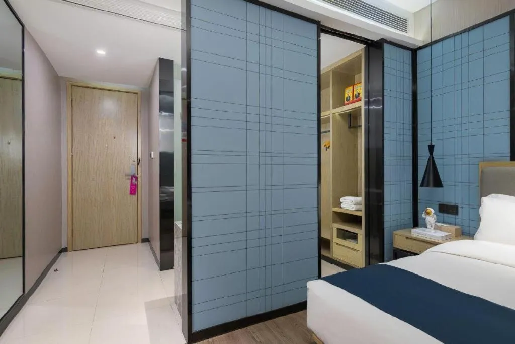 Bed in Echarm Hotel Danzhou Xiari Plaza