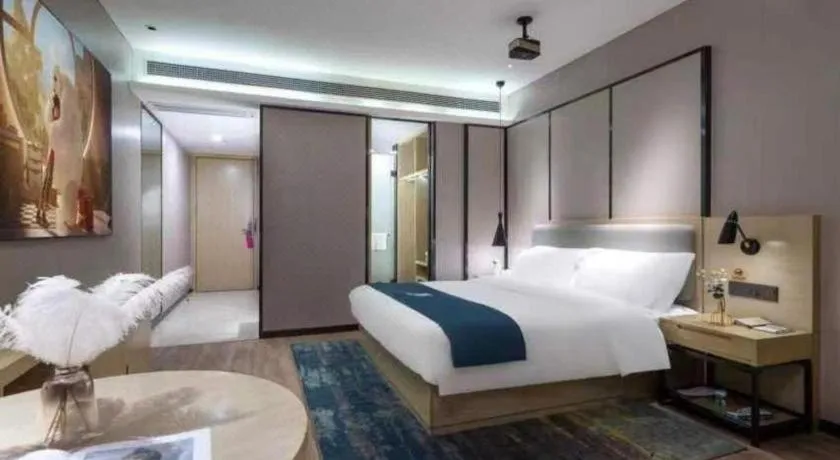 Bed in Echarm Hotel Danzhou Xiari Plaza