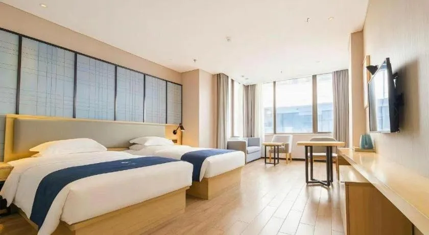 Bed in Echarm Hotel Danzhou Xiari Plaza