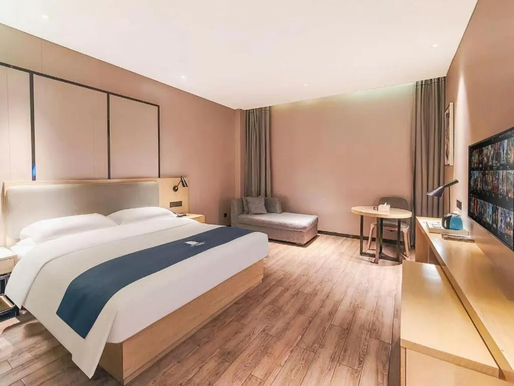 Bed in Echarm Hotel Danzhou Xiari Plaza