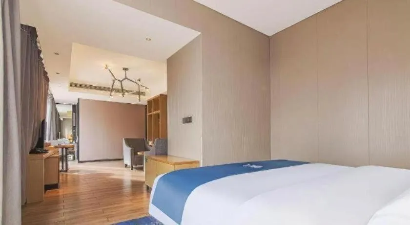 Bed in Echarm Hotel Danzhou Xiari Plaza