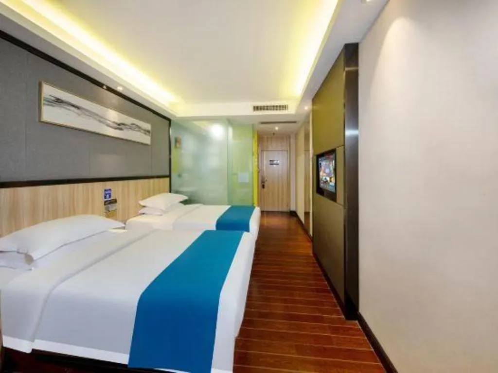 Bed in Wenxing Hotel Guangzhou Gangding Metro Station Branch