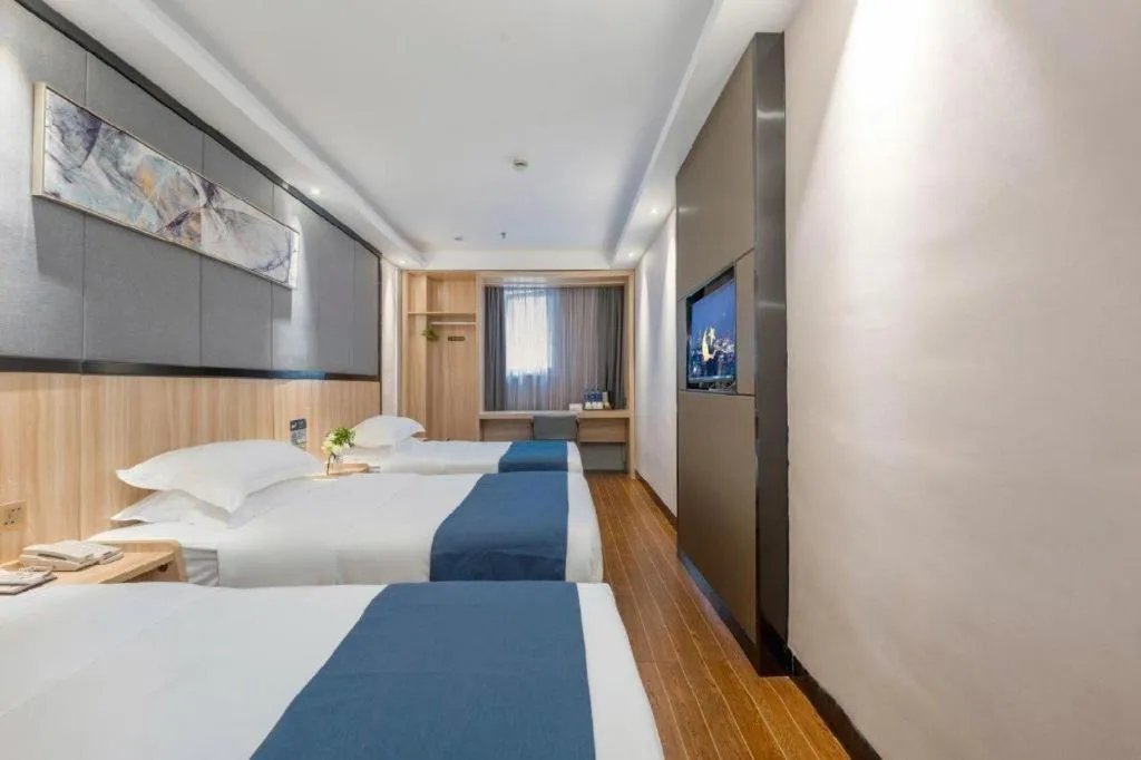 Bed in Wenxing Hotel Guangzhou Gangding Metro Station Branch