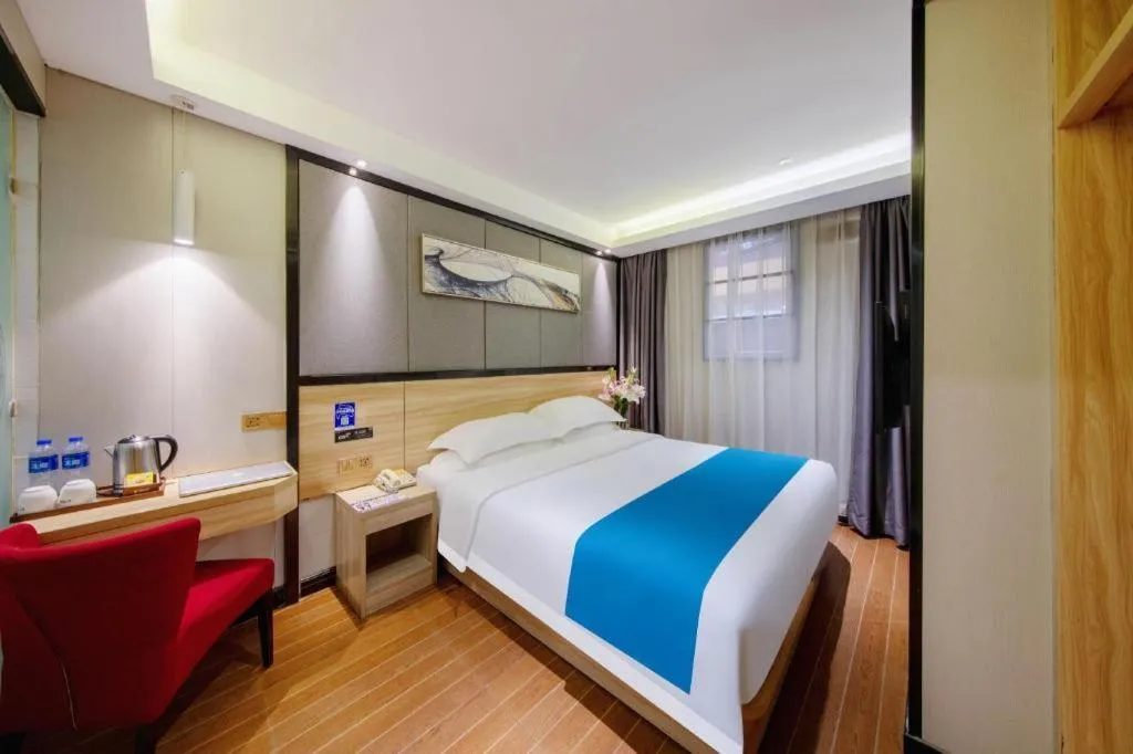 Bed in Wenxing Hotel Guangzhou Gangding Metro Station Branch